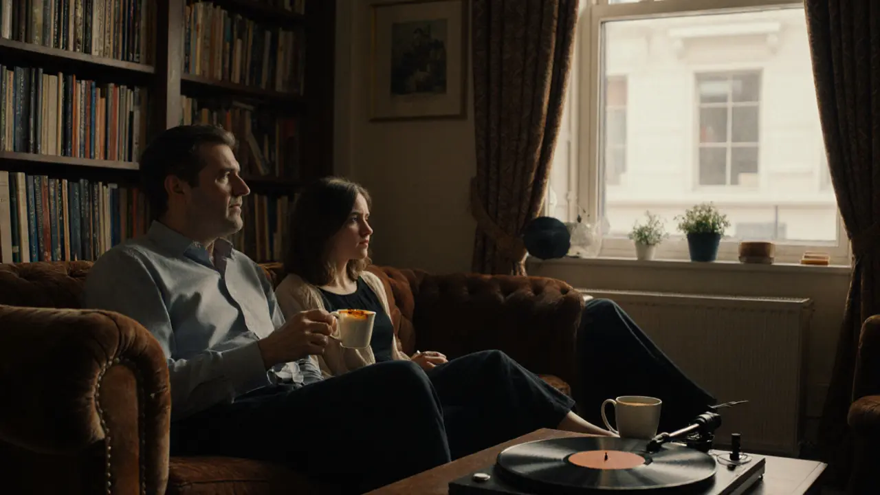 Two people conversing warmly in a book-filled Mayfair apartment, relaxed and connected.